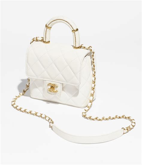 white flap bag chanel|white fluffy Chanel bag.